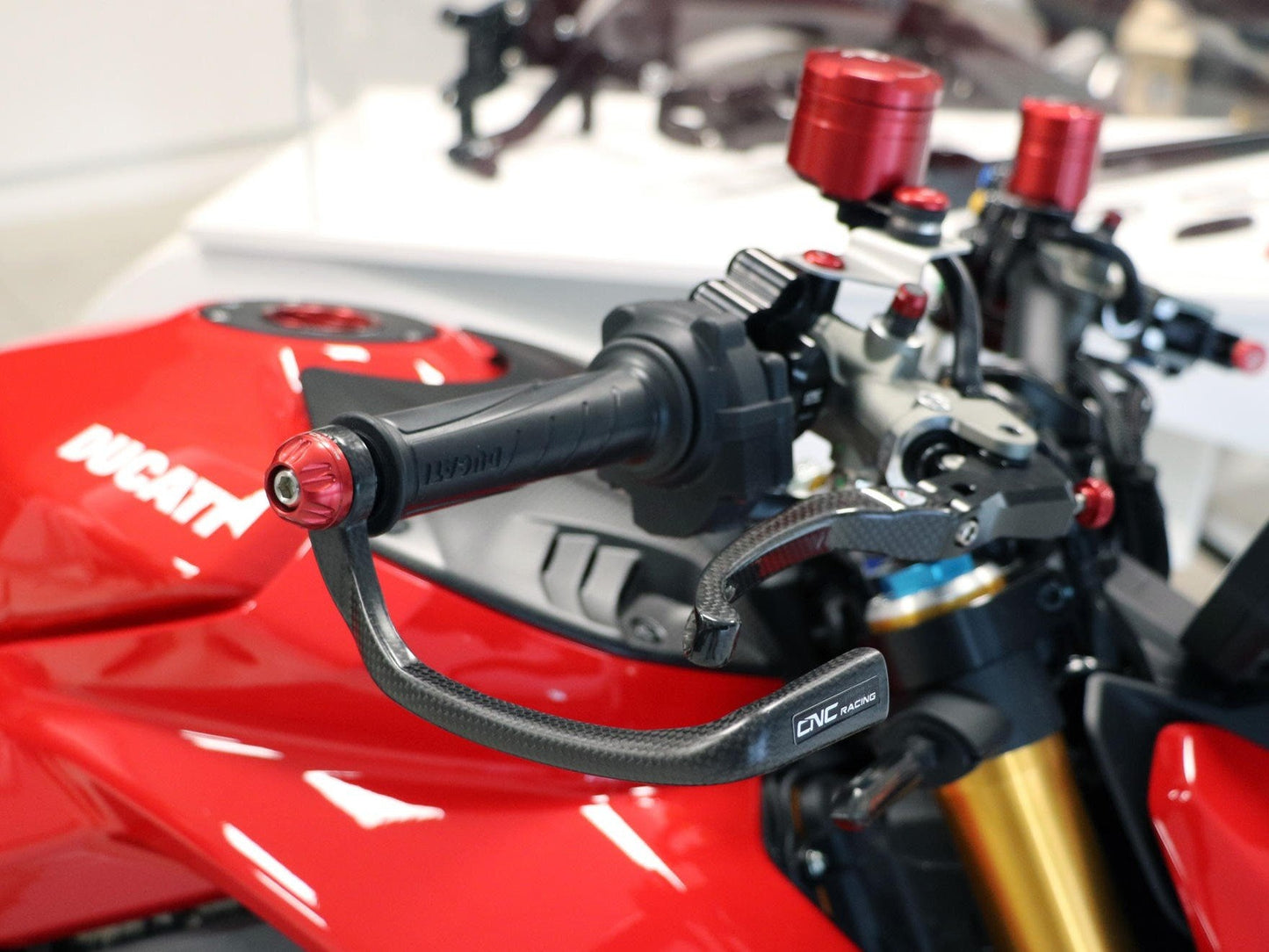 PL150 - CNC RACING Ducati Panigale V2 Carbon Racing Brake Lever Guard (including adapter)