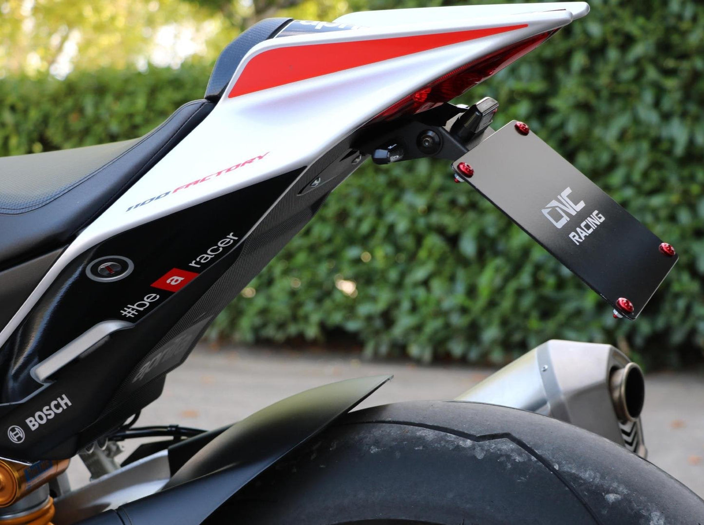 PT103 - CNC RACING Aprilia RSV4 / Tuono V4 (09/20) Adjustable LED License Plate Holder